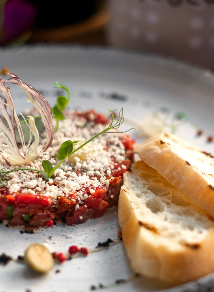 Tartare de magret de canard et huile de truffe
